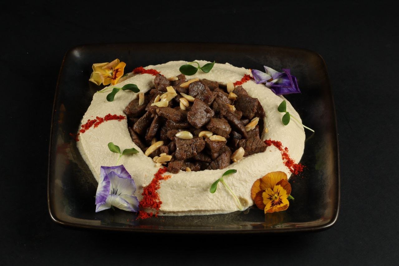 Hummus with pine nuts